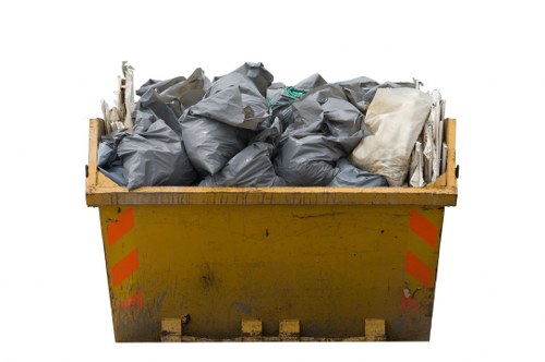 Recycling old furniture materials like wood and metal in Southfields.